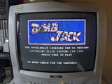 Commodore 64 port of "Bombjack" loaded on a small CRT TV